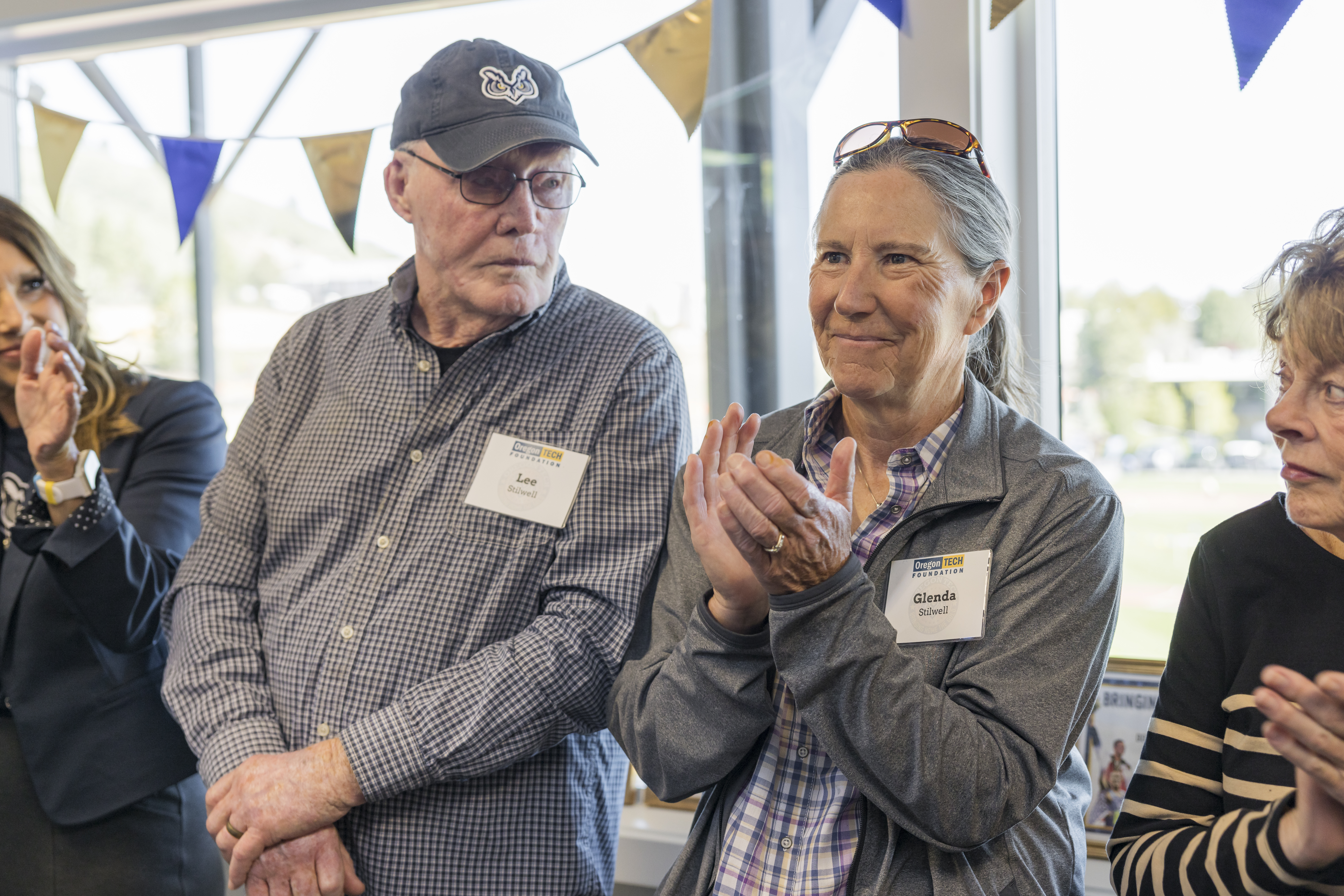People clapping at an event