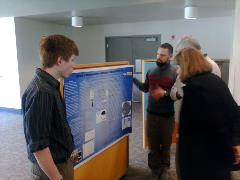 Students Adam Langenstein and Matthew Vinson present their u