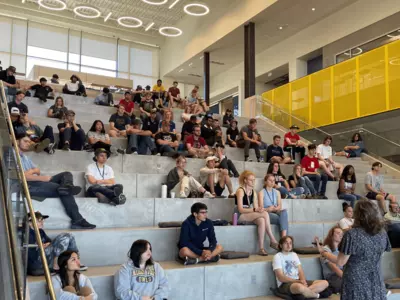 Students at the SOAR program listening to a presentation on the CEET steps.