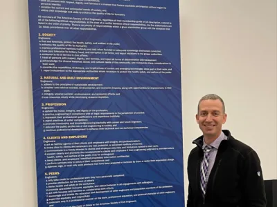 Riley with ASCE Code of Ethics Poster