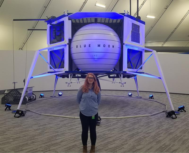 Rowan Blue Origin Internship - standing in front of the Blue Moon lunar lander during at Blue Origin