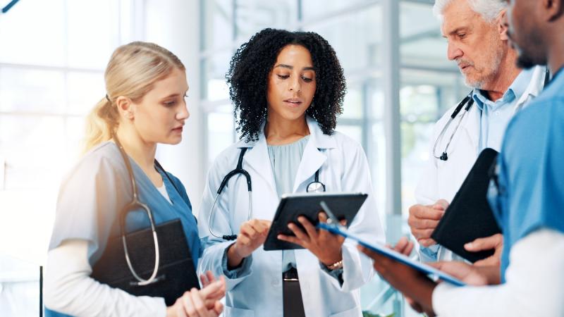 Doctor Leadership with staff