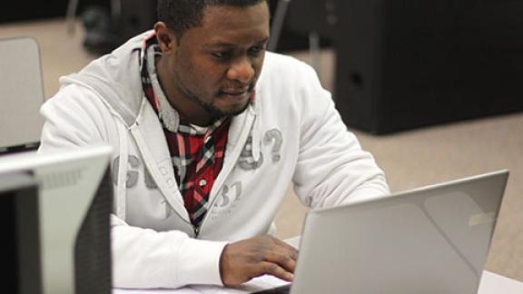 Student on Laptop