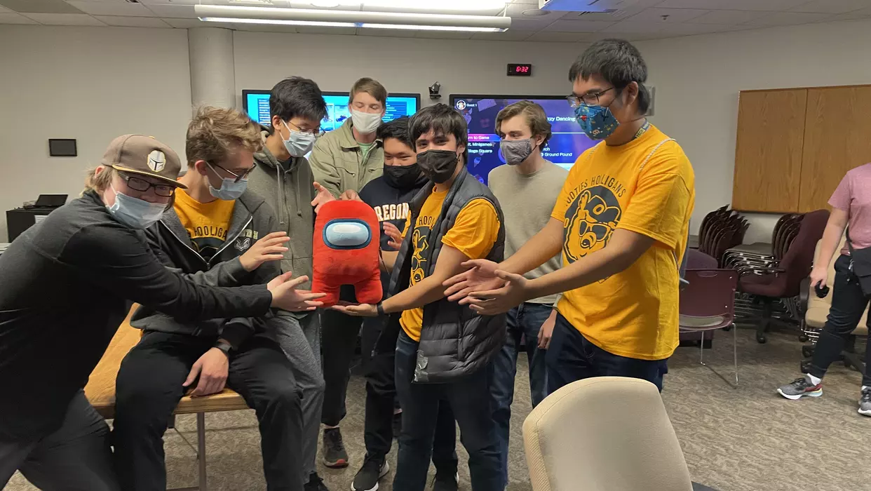 Oregon Tech Students with an Imposter Plushie