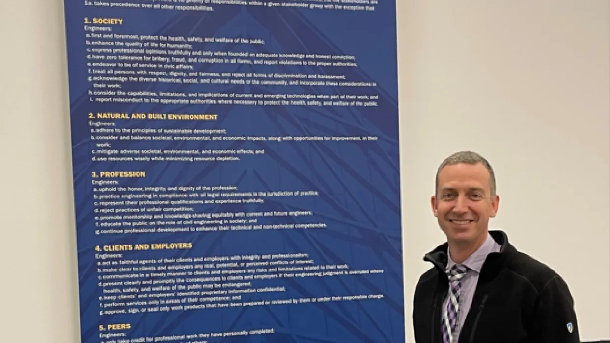 Riley with ASCE Code of Ethics Poster