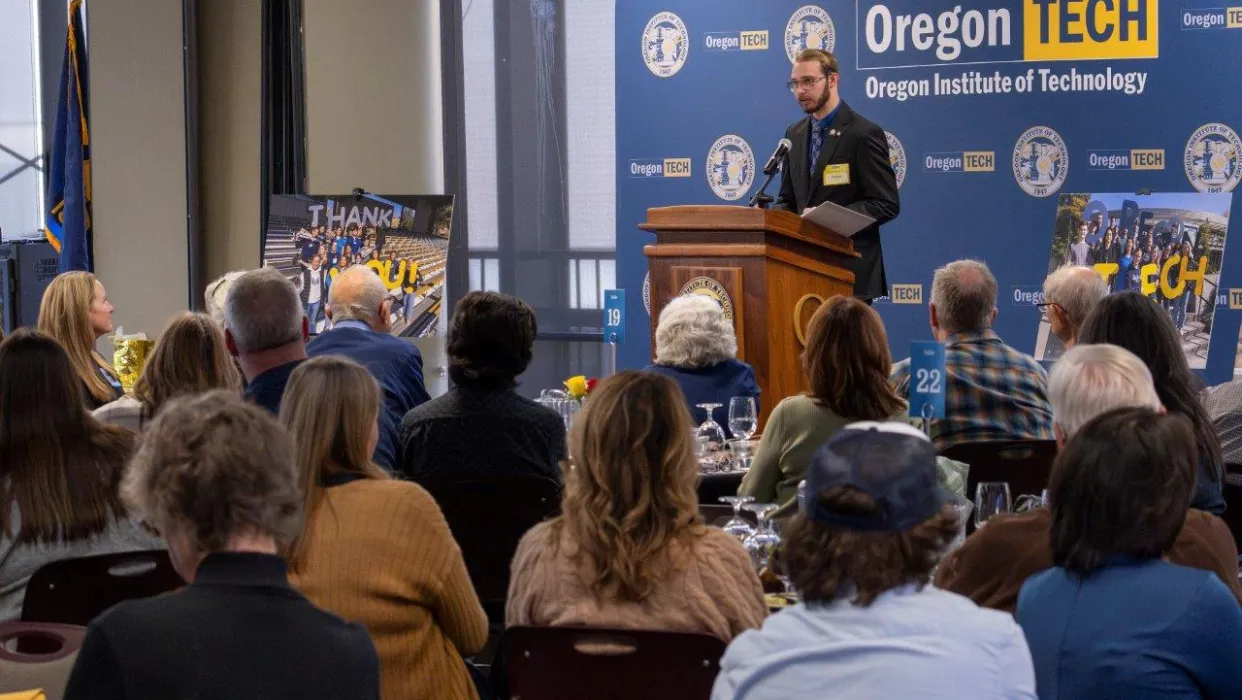 Student Colton Hurst speaking at scholarship banquet