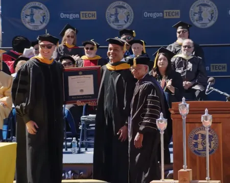 OHSU President Elnahal receiving honorary doctorate